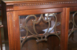 two door walnut antique bookcase with lattice work doors