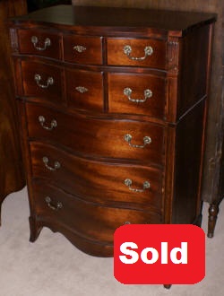 Serpentine front mahogany antique chest