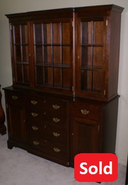 Suters Furniture Company solid mahgoany two piece Chippendale Breakfront china cabinet