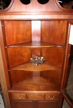 One door mahogany corner cabinet