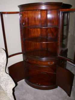 bow front mahogany corner cabinet
