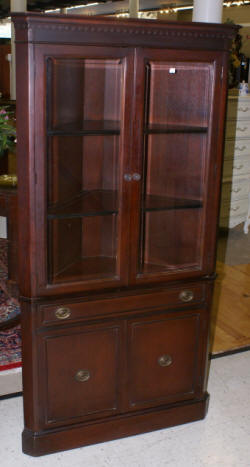 Beveled glass dark mahogany corner cabinet