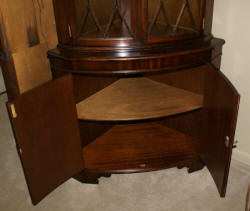 English flame mahogany antique corner cabinet