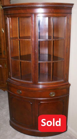 Drexel Travis Court Collection mahogany bow front corner cabinet