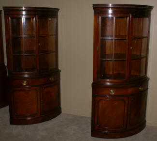 Matched pair of Drexel mahogany corner cabinets