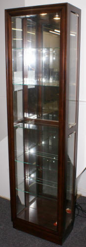 Dark mahogany curio cabinet by Pulaski Furniture Company