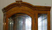 Lighted etched glass front oak corner curio cabinet by Pulaski Furniture Company