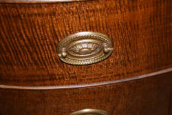 Urn inlaid mahogany kneehole desk