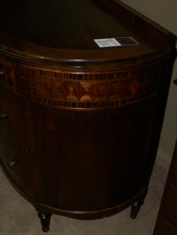 Demi-lune walnut inlaid antique dresser