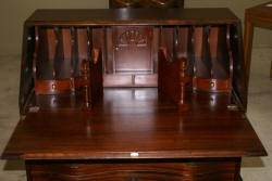 Antique mahogany serpentine front mahogany governor Winthrop desk 