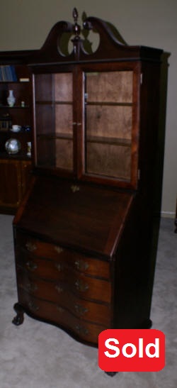 serpentine front antique mahogany secretary desk