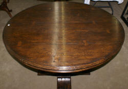 Jonathan Charles round extending oak dining room table