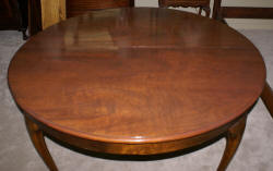 round walnut dining room table
